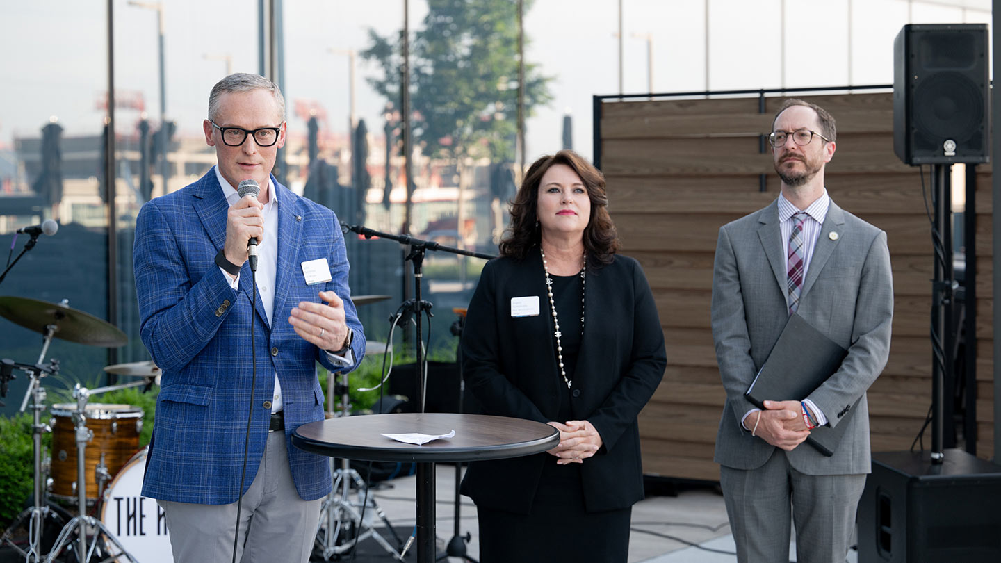 John Simmons, at left, Head of Commercial Banking, gives welcoming remarks alongside Angela Humphreys, Chair of the Healthcare Practice Group and Co-Chair of the Healthcare Private Equity Team at Bass, Berry & Sims, and Nashville Mayor Freddie O’Connell.