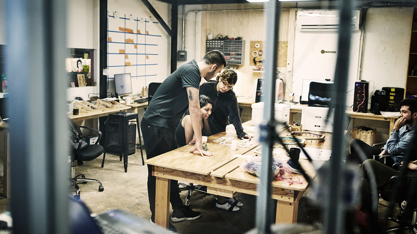 People in a workshop room