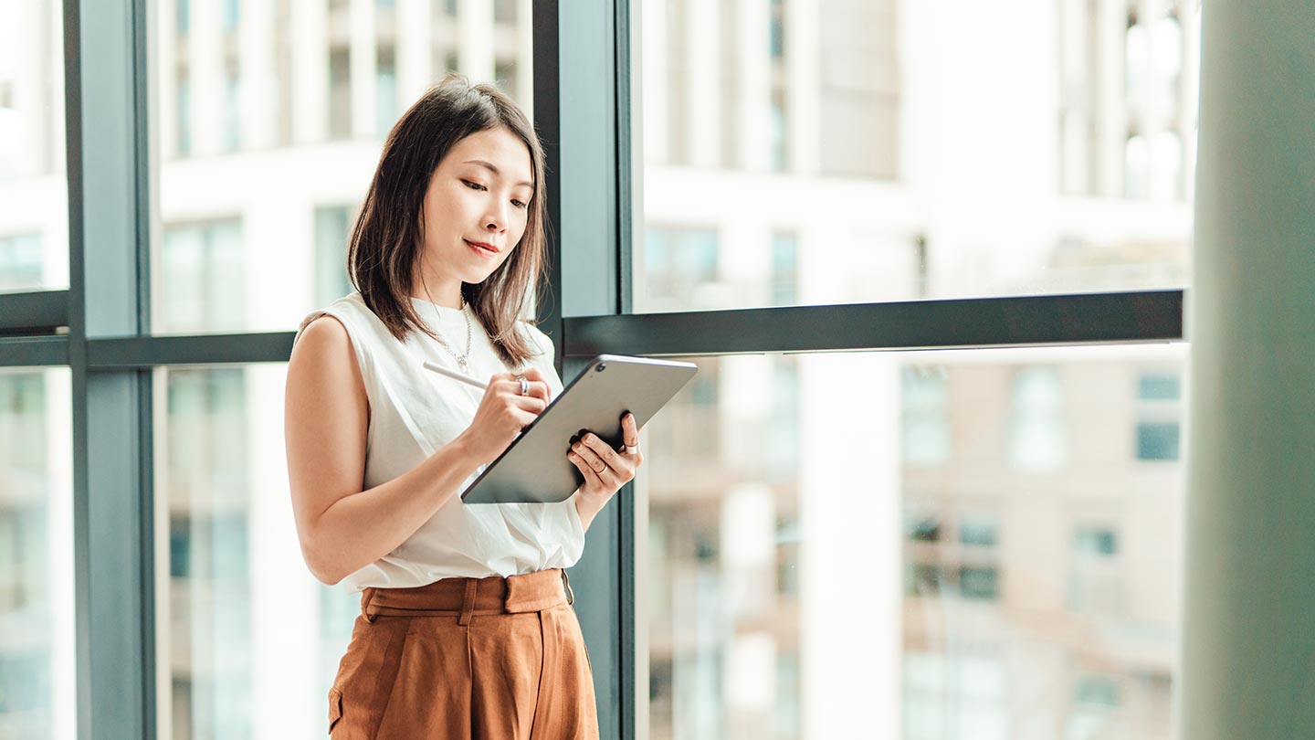 Woman working on tablet